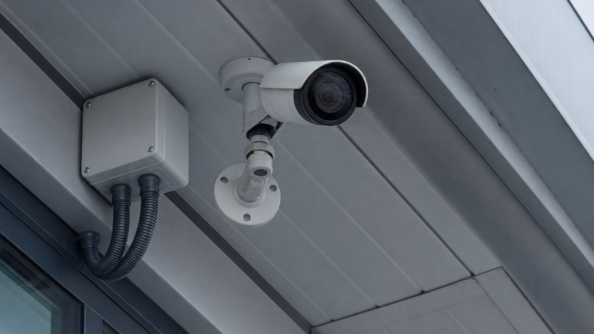 Professional CCTV camera mounted on a building exterior