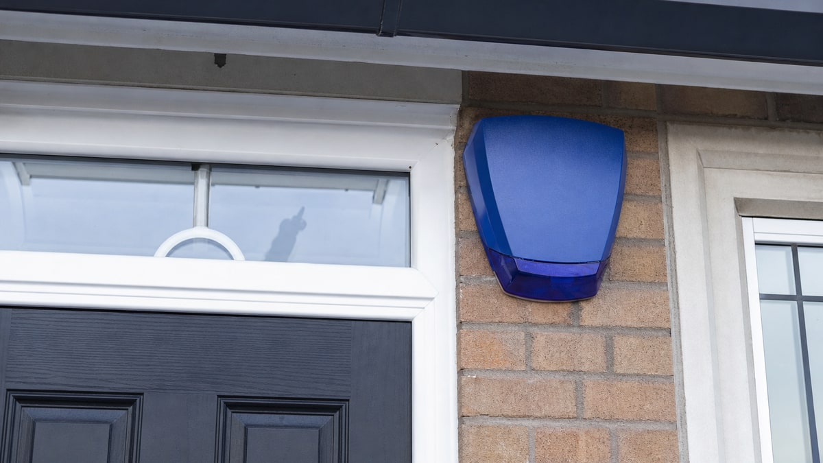 External alarm sounder mounted on a brick wall